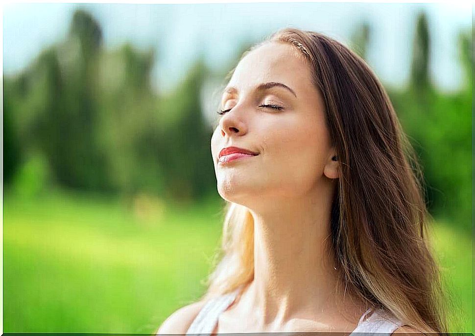 woman breathing clean air.